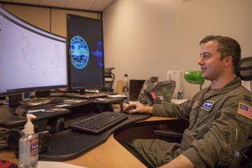 Capt. Kevin Thurber of the 315th Airlift Wing at Joint Base Charleston, S.C., uses the Puckboard software program to schedule C-17 aircrews.